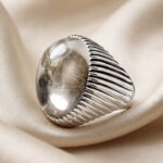 Natural transparent Dur al-Najaf cut as a high-domed cabochon, set in a 925 sterling silver ring